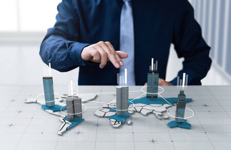 Businessman show chart profit company on digital 3d world map screenの写真素材