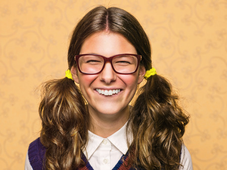 Portrait of young female nerd