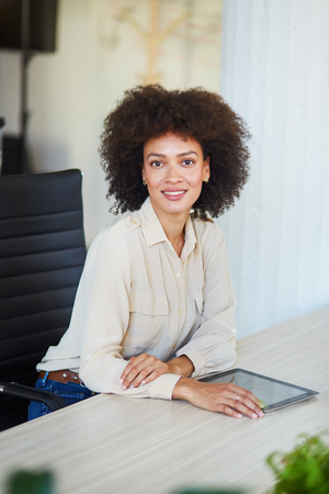 Young woman working in officeの写真素材