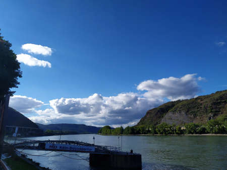 A steamboat on the Rhine river on a cloudy afternoon, KÃ¶ln, Germany on 09/09/2020.
