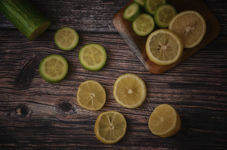 Sliced wooden table Detox juice, healthy beverage concept.の写真素材