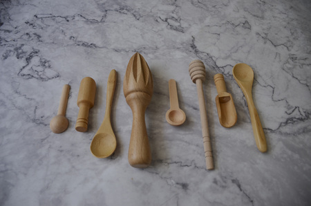Wooden kitchen utensils on table. Top view