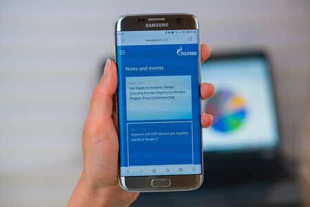 Barcelona / Spain 05 25 2019: Gazprom web site on mobile phone screen. Mobile version of Gazprom company web page on smartphone. Official web page of Gazprom.のeditorial素材