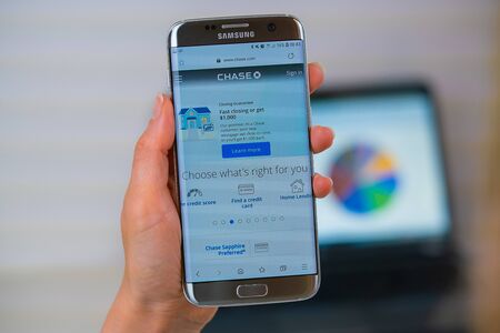 Barcelona / Spain 05 25 2019: Chase web site on mobile phone screen. Mobile version of Chase company web page on smartphone. Official web page of Chase.のeditorial素材