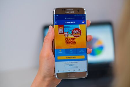 Barcelona / Spain 05 25 2019: Ryanair web site on mobile phone screen. Mobile version of Ryanair company web page on smartphone. Official web page of Ryanairのeditorial素材