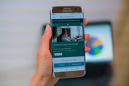 Barcelona / Spain 05 25 2019: Cathay Pacific web site on mobile phone screen. Mobile version of Cathay Pacific company web page on smartphone. Official web page of Cathay Pacific.のeditorial素材