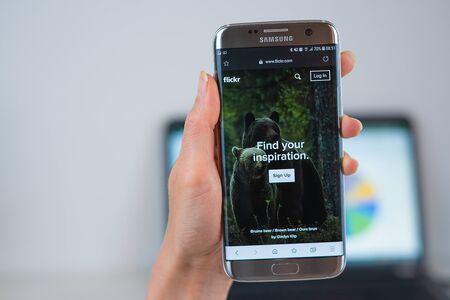 Barcelona / Spain 05 25 2019: Flickr web site on mobile phone screen. Mobile version of Flickr...