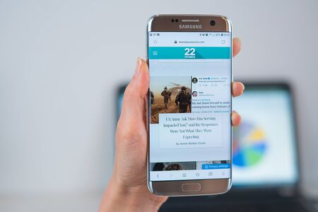Barcelona / Spain 05 25 2019: Twentytwo words web site on mobile phone screen. Mobile version of Twentytwo words company web page on smartphone. Official web page of 22words.のeditorial素材