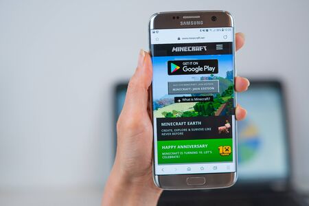 Barcelona / Spain 05 25 2019: Minecraft web site on mobile phone screen. Mobile version of Minecraft game web page on smartphone. Official web page of Minecraft.のeditorial素材