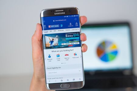 Barcelona / Spain 06 10 2019: HDFC Bank web site on mobile phone screen. Mobile version of HDFC Bank company web page on smartphone. Official web page of HDFC Bank.のeditorial素材