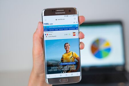 Barcelona / Spain 06 10 2019: FIFA web site on mobile phone screen. Mobile version of fifa web page on smartphone. Official web page of fifa.のeditorial素材