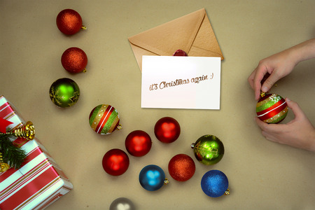 Christmas arrives. Person arranging Christmas decorationsの写真素材