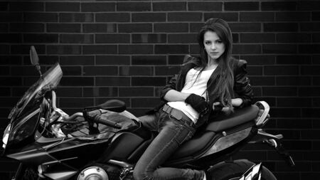 Biker girl, sexy biker girl with bike, motorbike, motorcycle, beautiful, serious, attractive,...