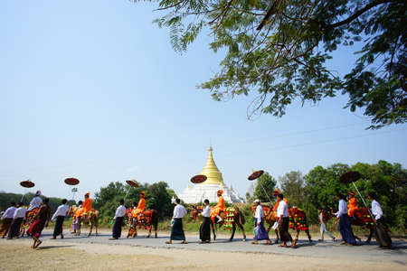 Unidentified Burmese people walk on the street at Bagan, Myanmar.