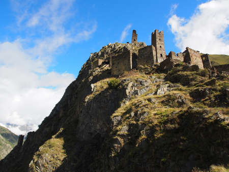 Ruins of a medieval castle in the mountains of the Caucasus.