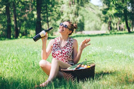 female relaxing freetime portrait in garden in forestの写真素材