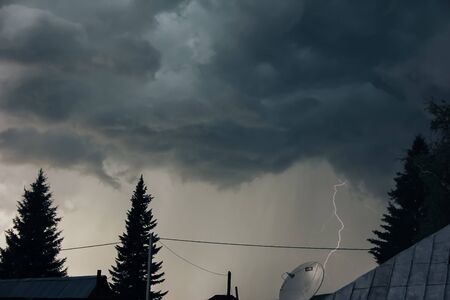 Background of storm clouds before a thunder-storm, lightningの写真素材
