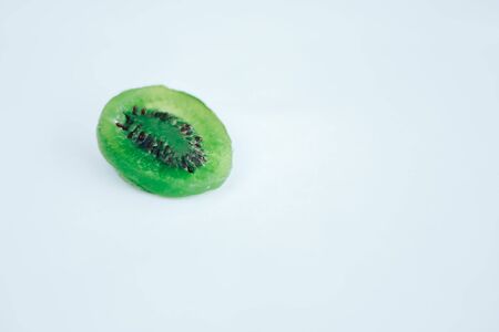 dry kiwi on white tableの写真素材