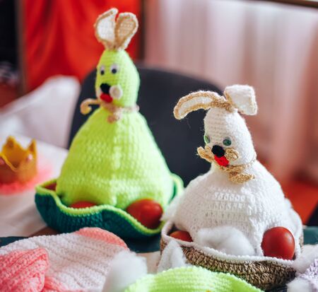 Knitted Chicken and Bunny with Easter egg. Easter toysの写真素材
