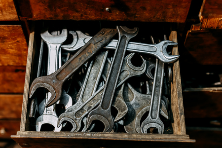 Locking pliers and wrench in tool box backgroundの写真素材