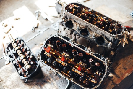 colorful car engine part standing in garage