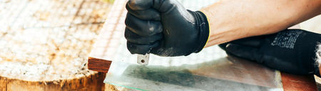 Technicians are using cutting tools, cut glass according to customer size long bannerの写真素材