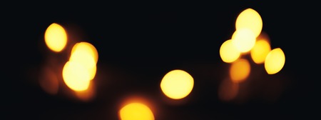 Christmas background. Festive abstract background with bokeh defocused lights and stars long bannerの写真素材