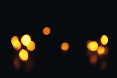 Christmas background. Festive abstract background with bokeh defocused lights and starsの写真素材