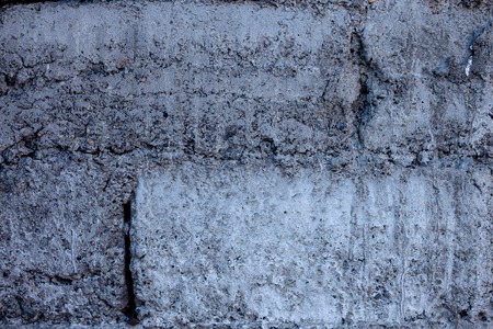 Brick concrete block wall material grey background.