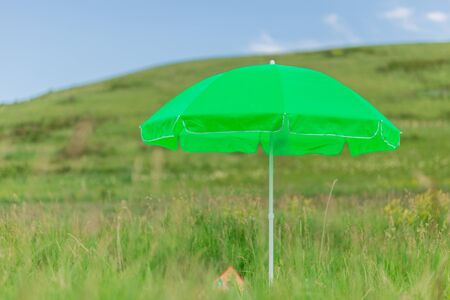 Modern green neon umbrellaの写真素材