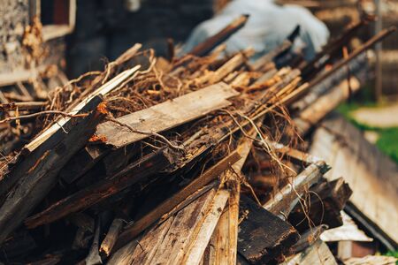 Abandoned wooden building, a ruin built of wood planks, destroyed, collapsed property.の写真素材