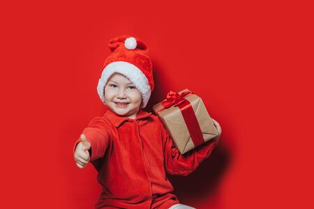 little boy with christmas giftの写真素材