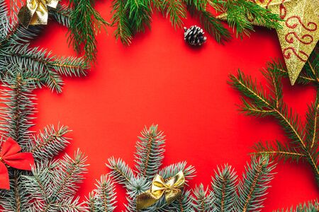 Frame of christmas decoration on red background.の写真素材