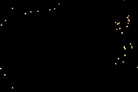 glitter lights on black backgroundの写真素材