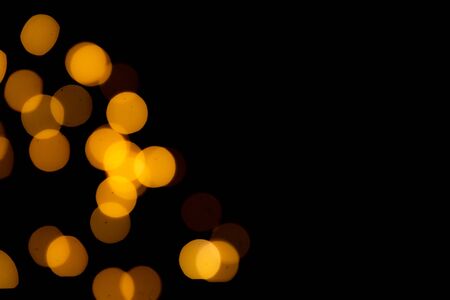 bokeh lights on black backgroundの写真素材