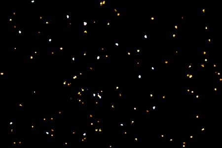glitter lights on black backgroundの写真素材