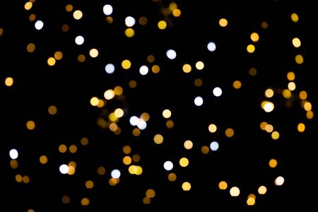 bokeh lights on black backgroundの写真素材