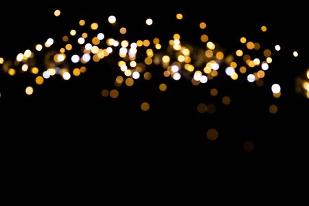 glitter lights on black backgroundの写真素材