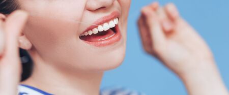 Woman smile with dental floss