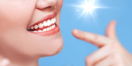Beautiful perfect smile of young woman.の写真素材