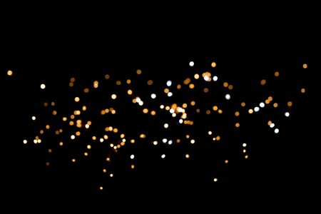 glitter lights on black backgroundの写真素材