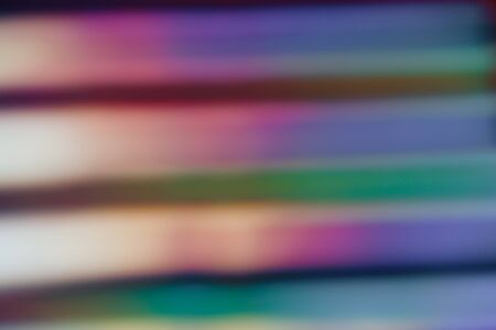 Holographic background with different colors. Holographic lines on black background. Neon lines.の写真素材