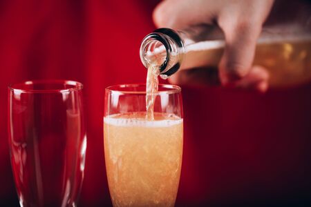 Valentines day background with champagne glasses and red roseの写真素材