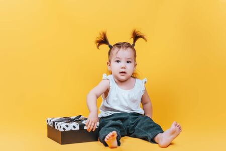 picture of beautiful girl with gift boxの写真素材