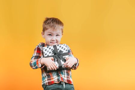 boy holding presentの写真素材