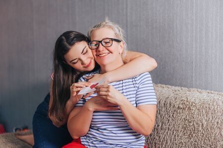 Mature Mother And Daughter Huggingの写真素材