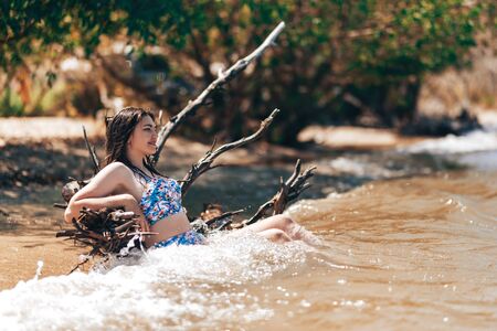 Summer lifestyle portrait of young woman.の写真素材