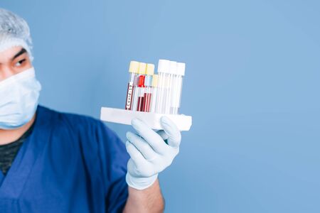 doctor holding test tubesの写真素材