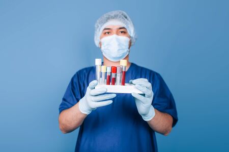 doctor holding test tubesの写真素材