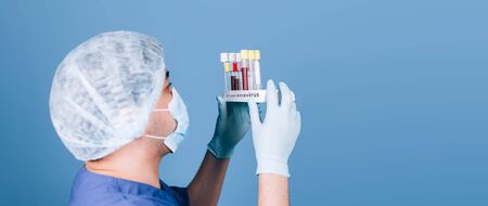 doctor holding test tubesの写真素材